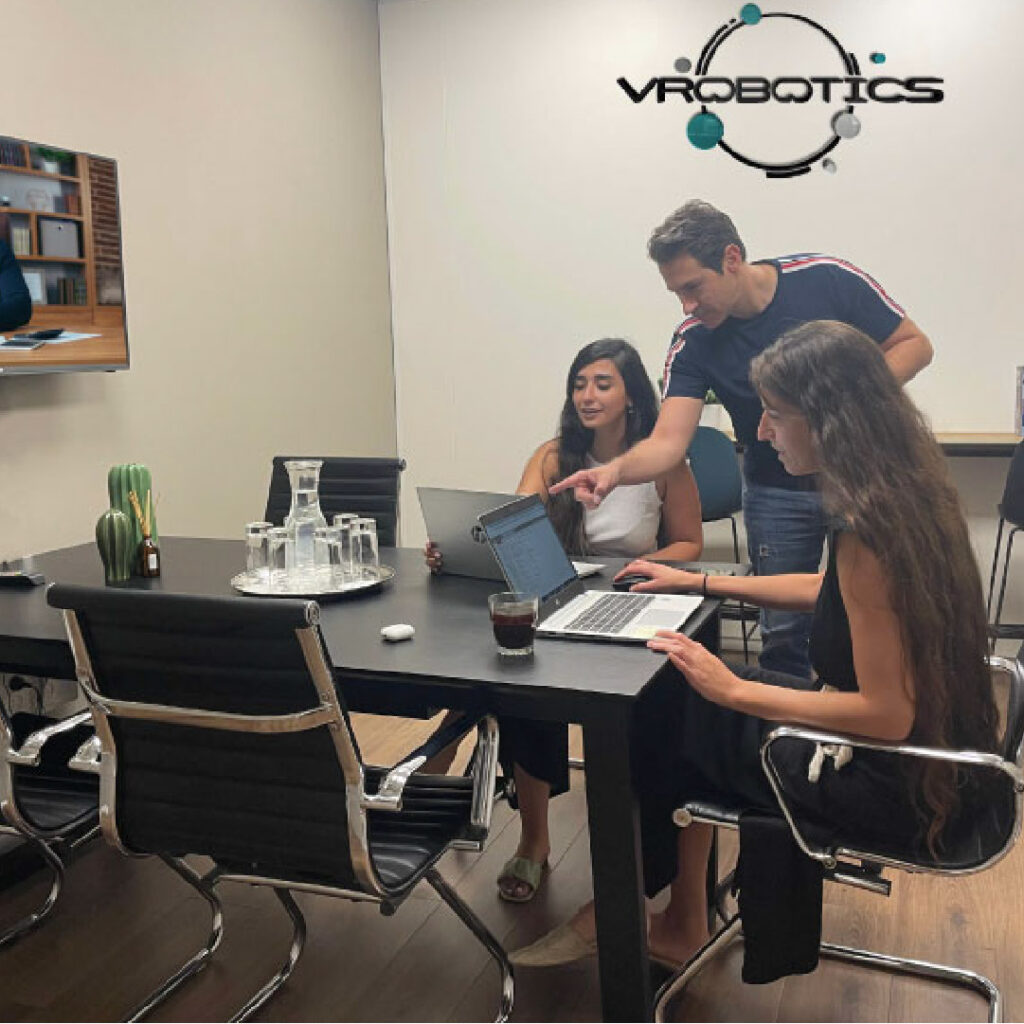VRobotics workers in a meeting